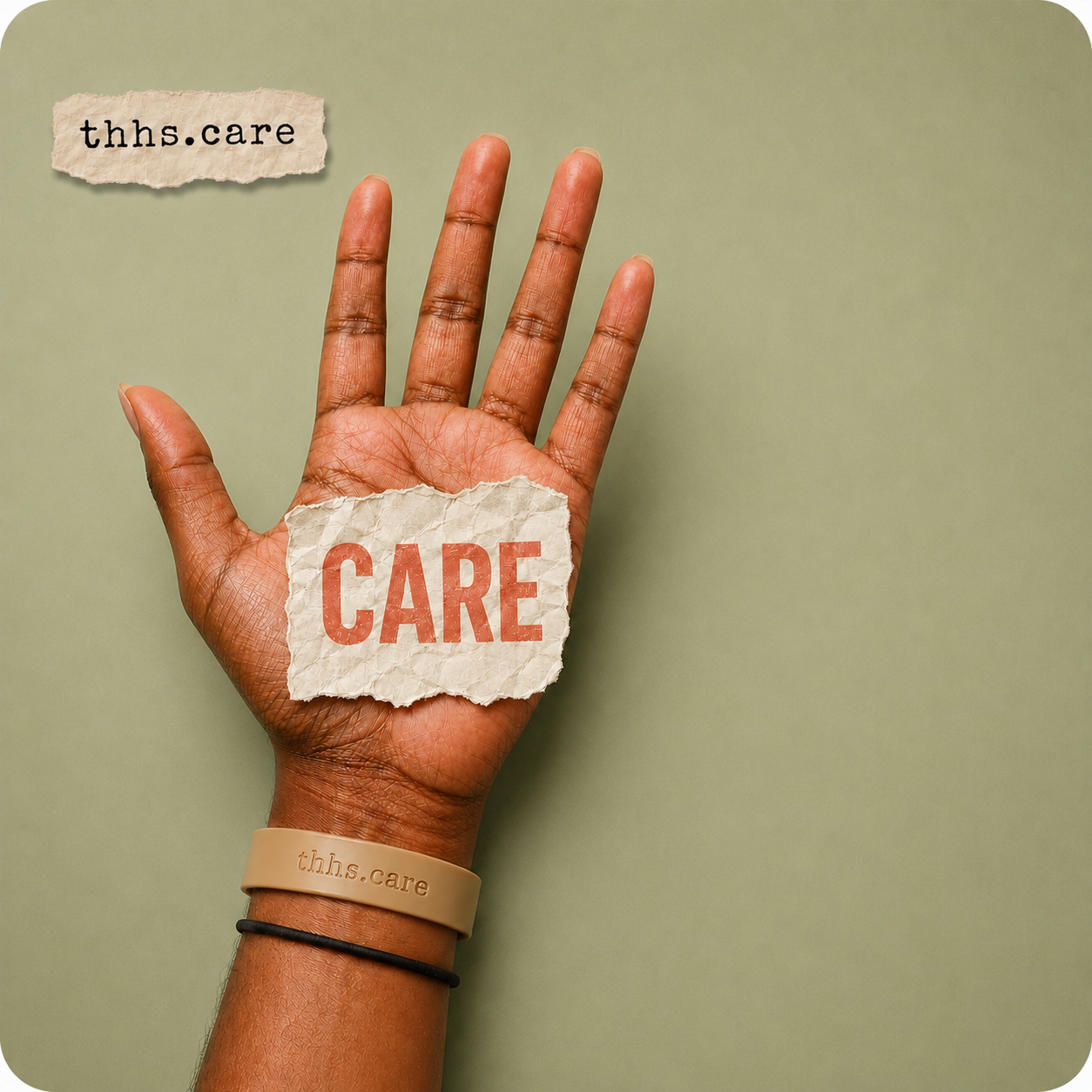 An open hand holding a torn paper note that reads CARE, with a thhs.care wristband